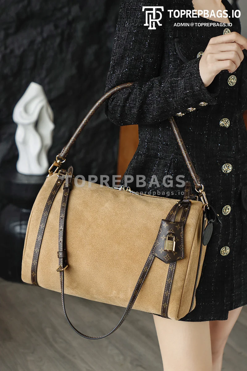 i1764672601058_2120_0_0 Louis Vuitton Express Medium in Brown