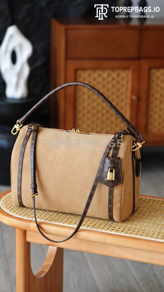i1764672669847_5094_0_0 Louis Vuitton Express Medium in Brown