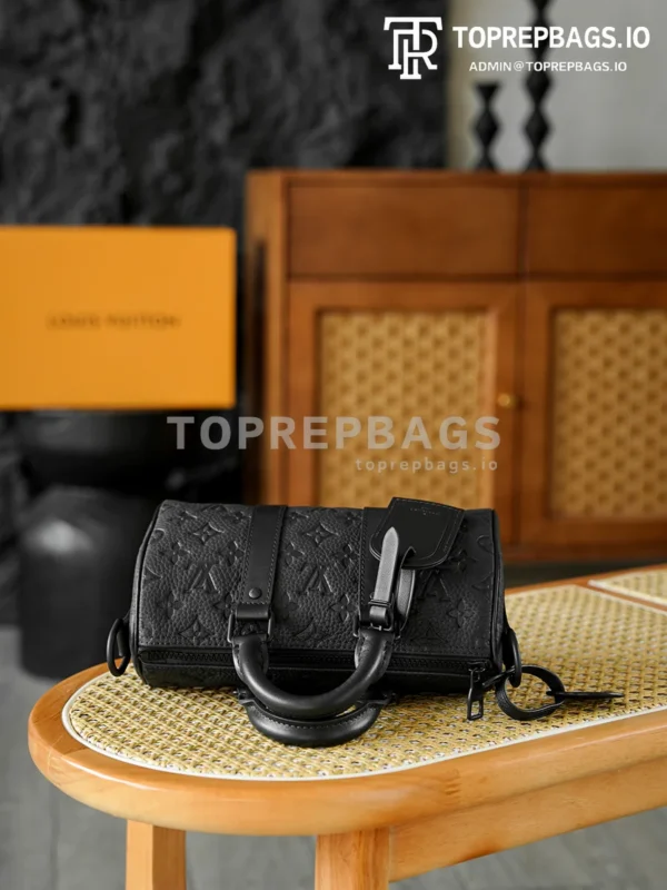 i1765460333647_8695_0_7 Louis Vuitton Keepall in Black