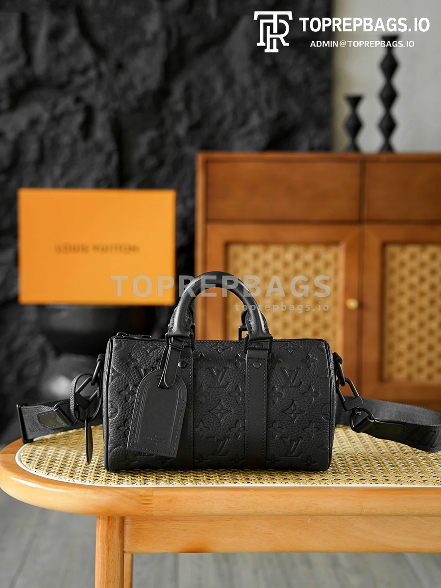 i1765460333647_9970_0_0 Louis Vuitton Keepall in Black