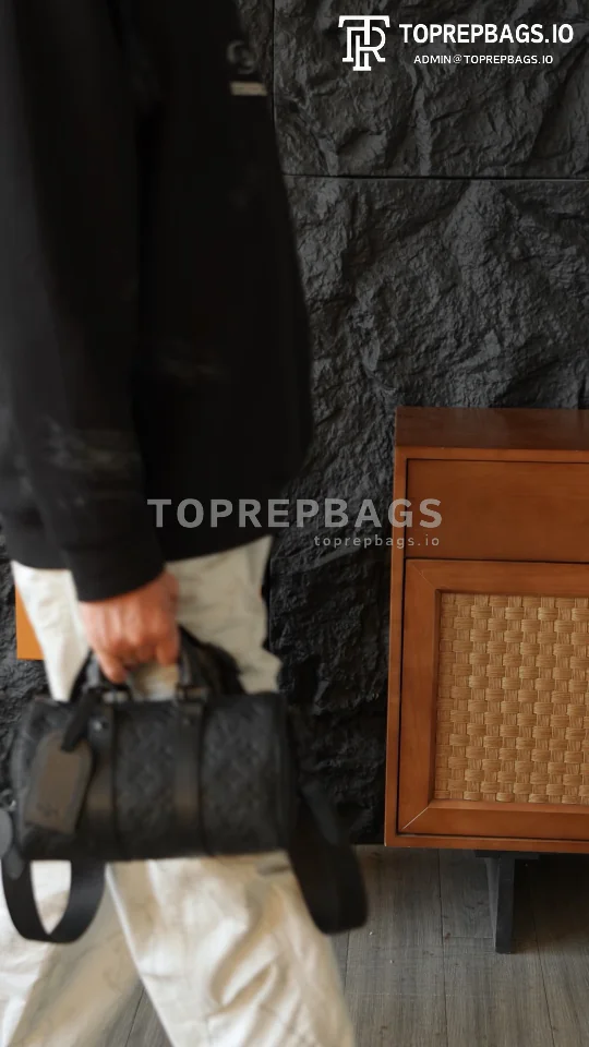 i1765460586380_2842_0_0 Louis Vuitton Keepall in Black