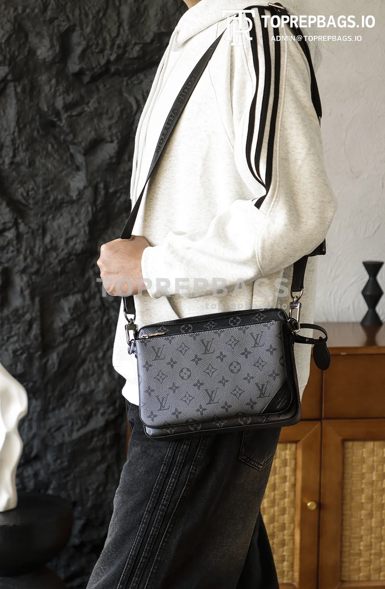 i1765522337845_5701_0_1 Louis Vuitton Trio Messenger in Grey