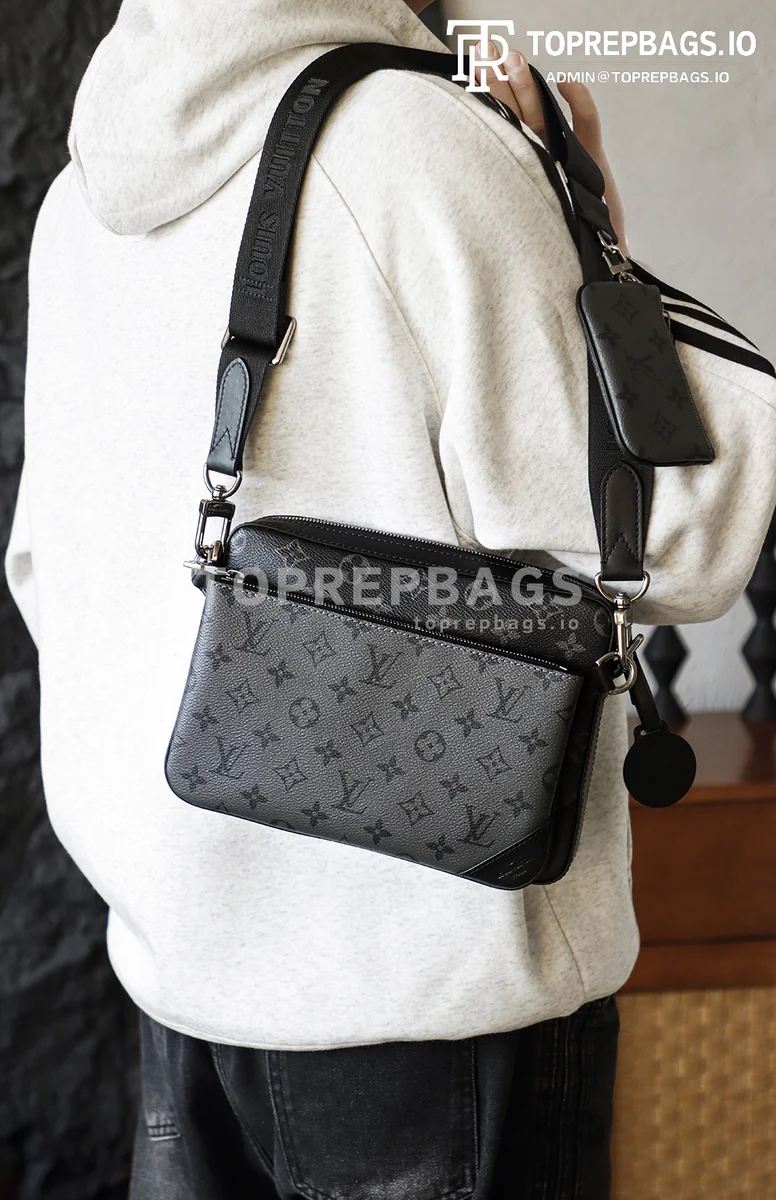 i1765522338564_6968_0_0 Louis Vuitton Trio Messenger in Grey