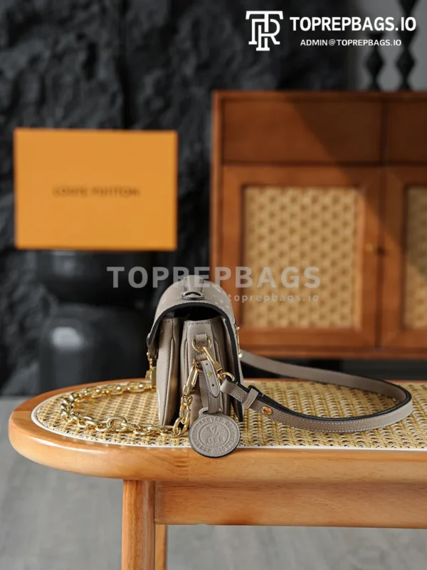 i1766219879642_218_0_2 Louis Vuitton Pochette Metis in Taupe