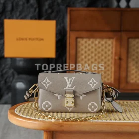 i1766219880079_6709_0_0 Louis Vuitton Pochette Metis in Taupe