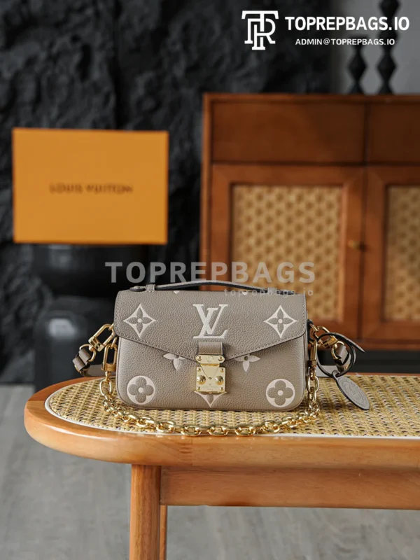 i1766219880079_6709_0_0 Louis Vuitton Pochette Metis in Taupe