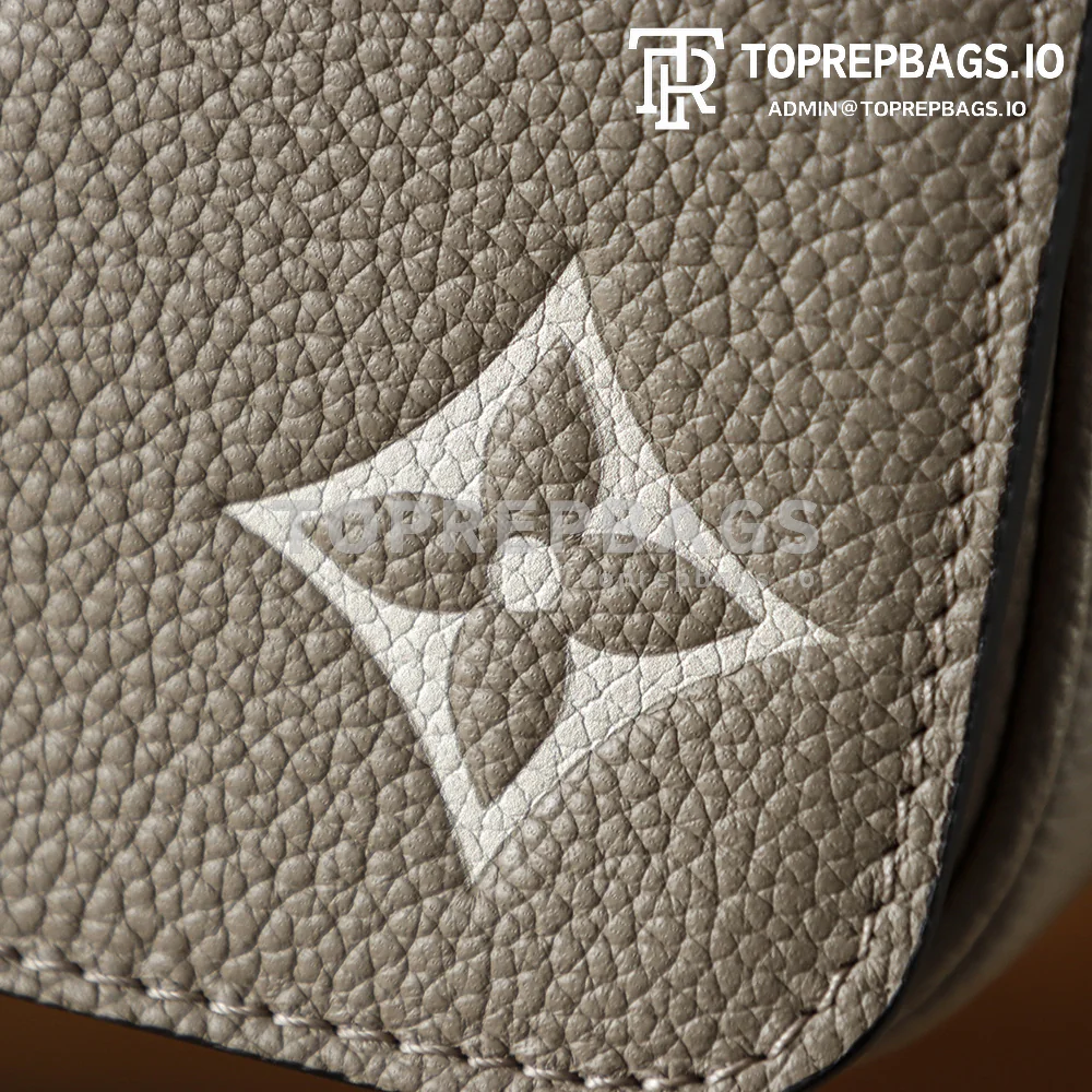i1766220036682_3855_0_5 Louis Vuitton Pochette Metis in Taupe