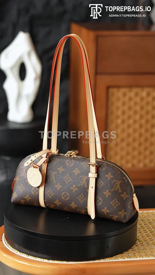 i1775806542207_1849_0_0 Louis Vuitton Alma Hobo in Brown