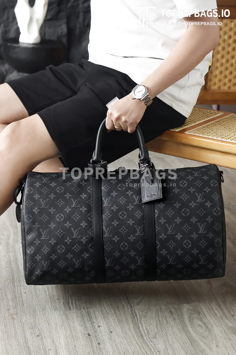 i1776404278000_6086_0_0 Louis Vuitton Keepall Bandouliere in Black