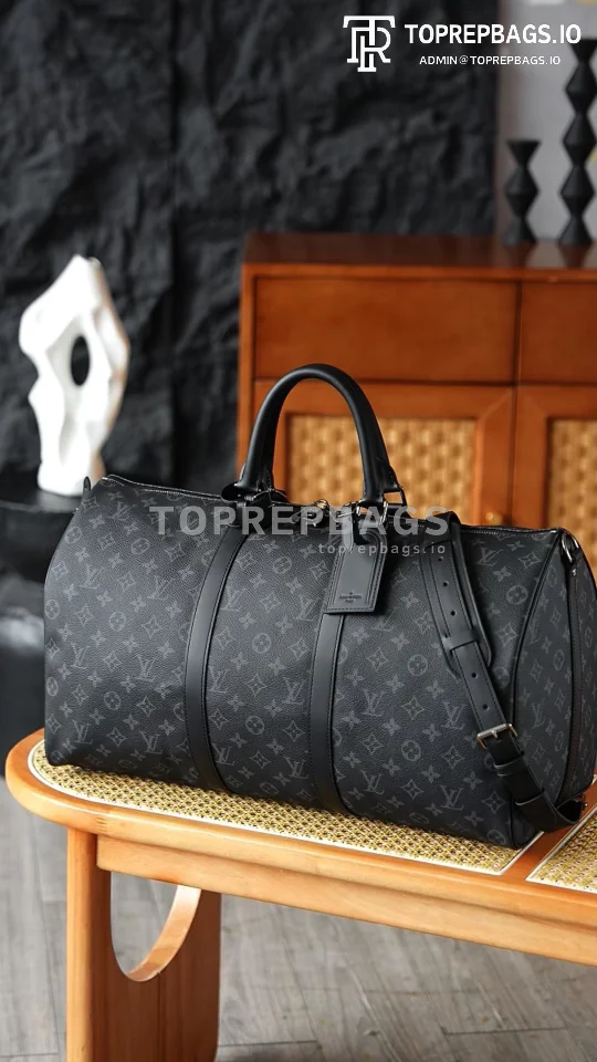 i1776404289937_9796_0_0 Louis Vuitton Keepall Bandouliere in Black