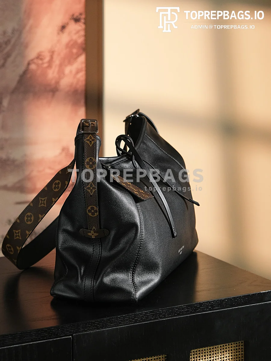 a1717676328397_3757 Louis Vuitton CarryAll in Black
