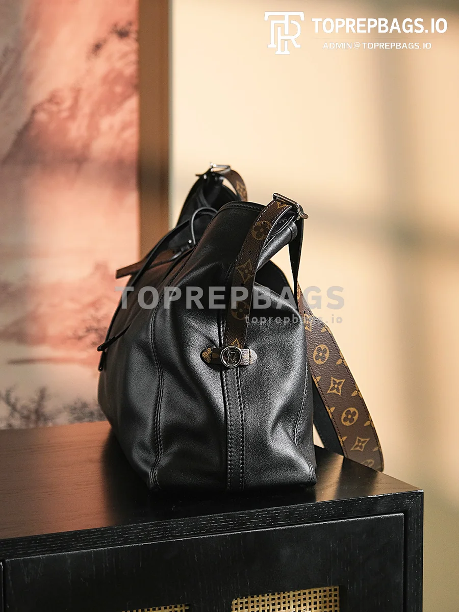 a1717676328397_8730 Louis Vuitton CarryAll in Black