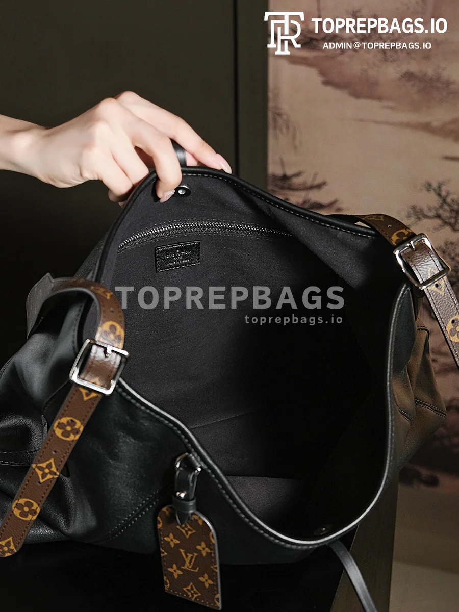 a1717676358758_4788 Louis Vuitton CarryAll in Black