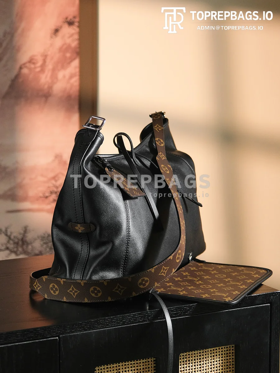 a1717676358772_8854 Louis Vuitton CarryAll in Black