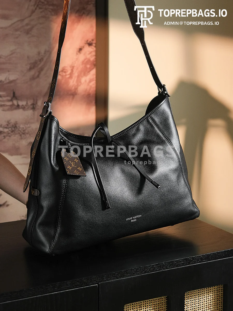 a1717676389036_2213 Louis Vuitton CarryAll in Black