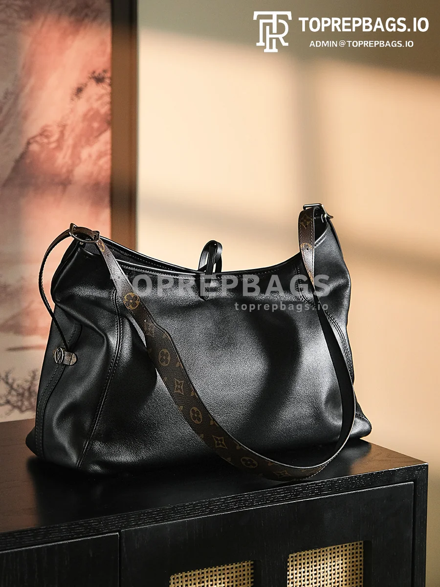 a1717676389036_5773 Louis Vuitton CarryAll in Black