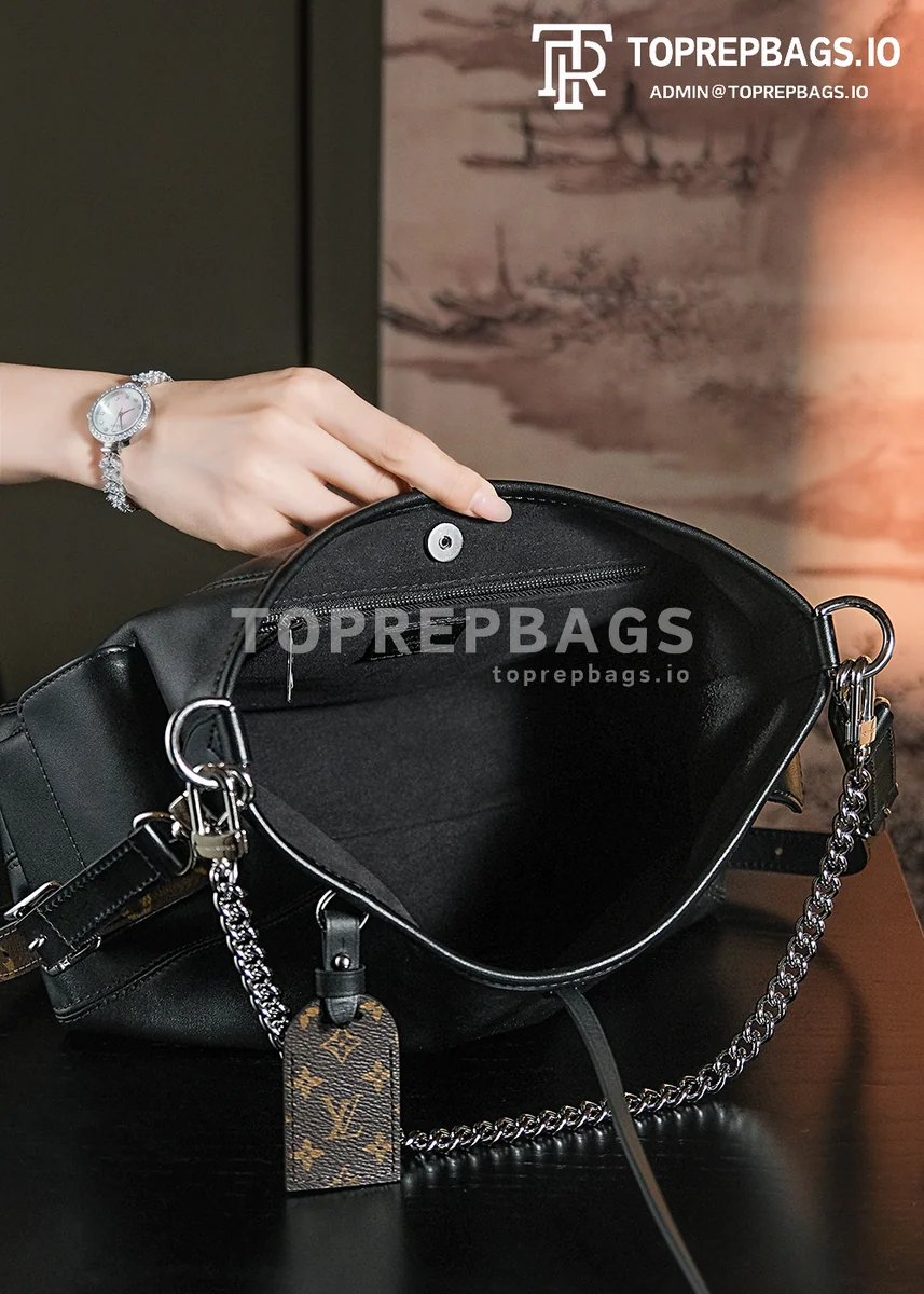 a1717676579264_2673 Louis Vuitton CarryAll in Black