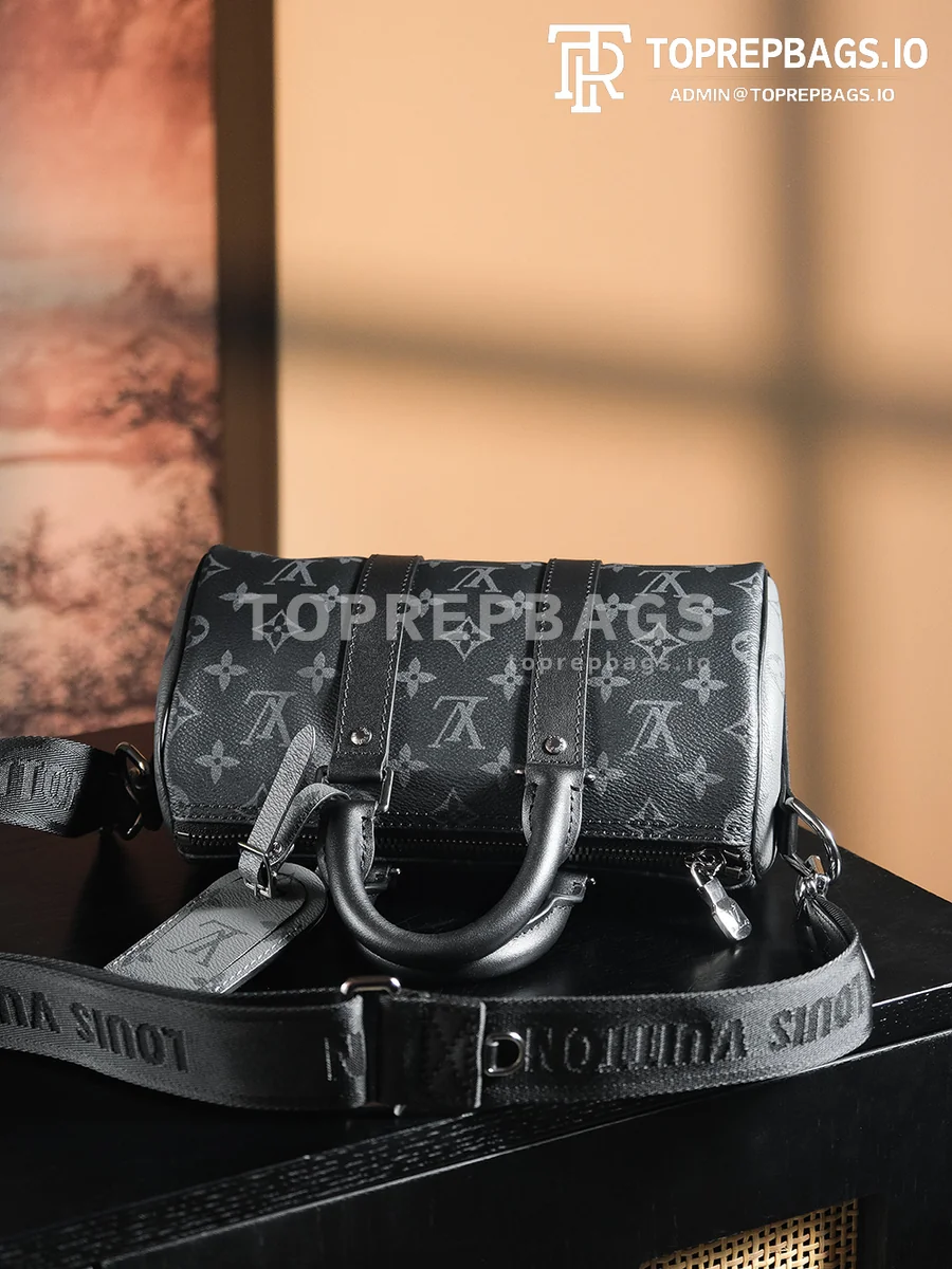 a1728305480059_5813 Louis Vuitton Keepall in Black