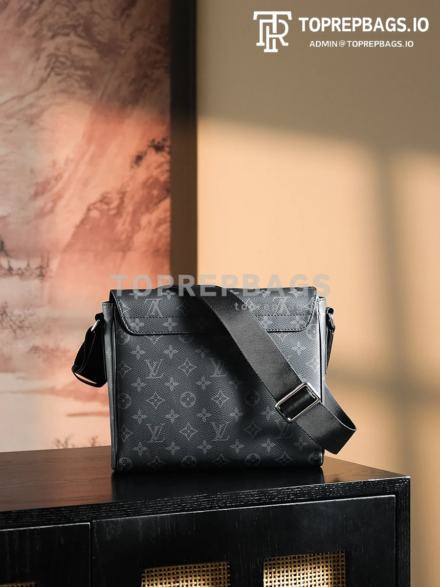 a1732614395783_3727 Louis Vuitton District Messenger in Black