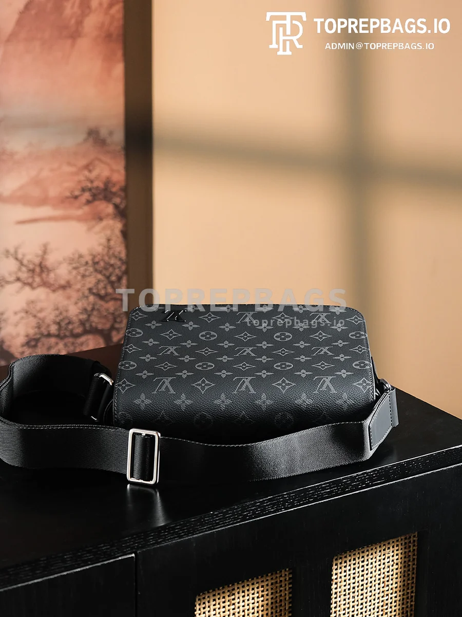 a1732614408723_4183 Louis Vuitton District Messenger in Black
