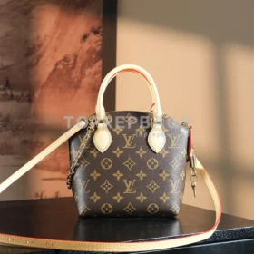 Louis Vuitton Lockit BB in Brown