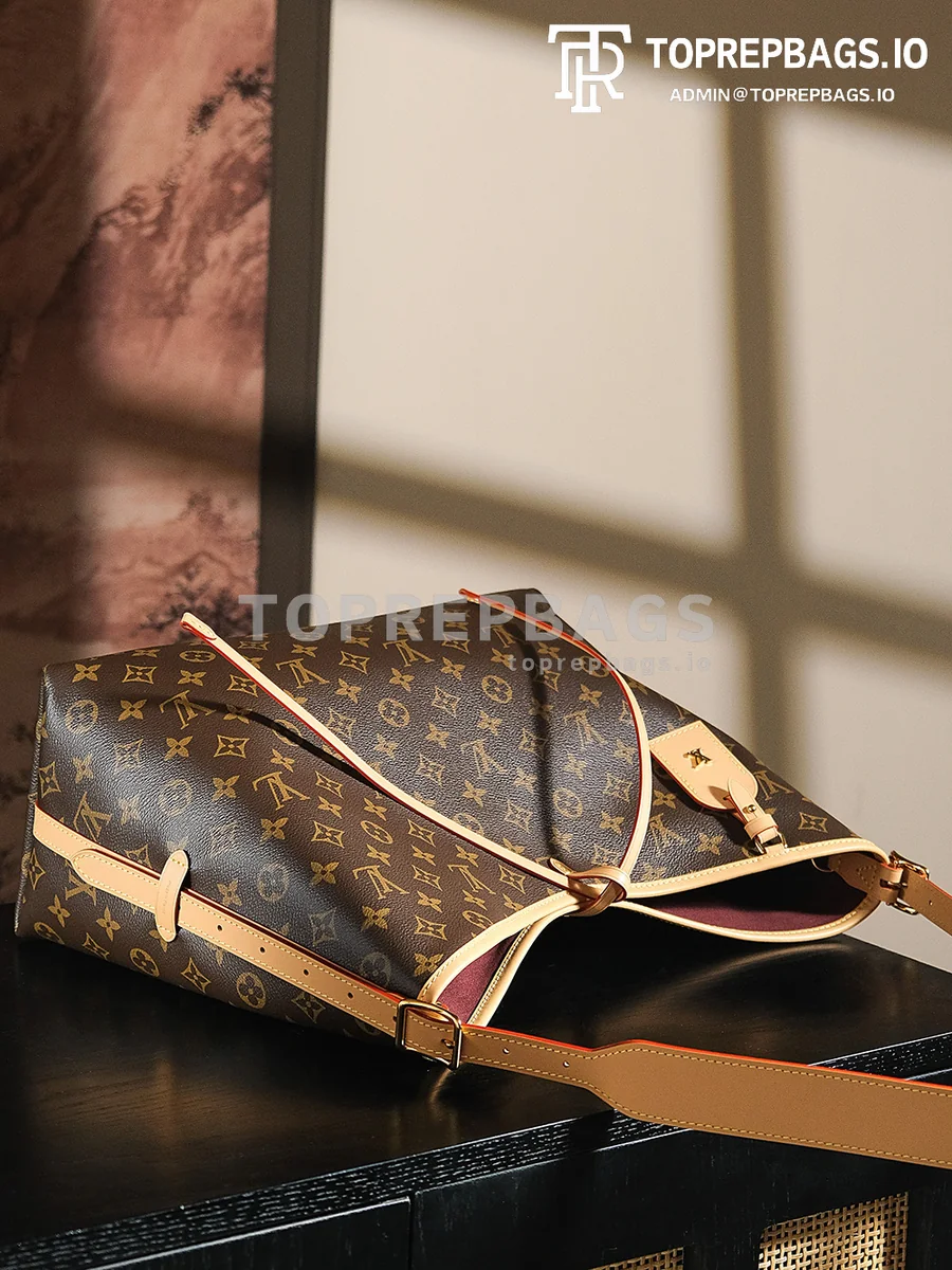a1741599352820_4171 Louis Vuitton CarryAll in Brown