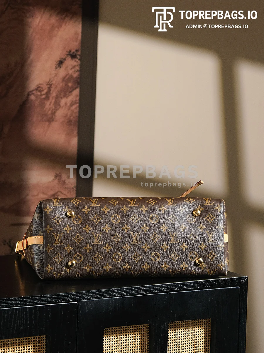 a1741599352843_1034 Louis Vuitton CarryAll in Brown