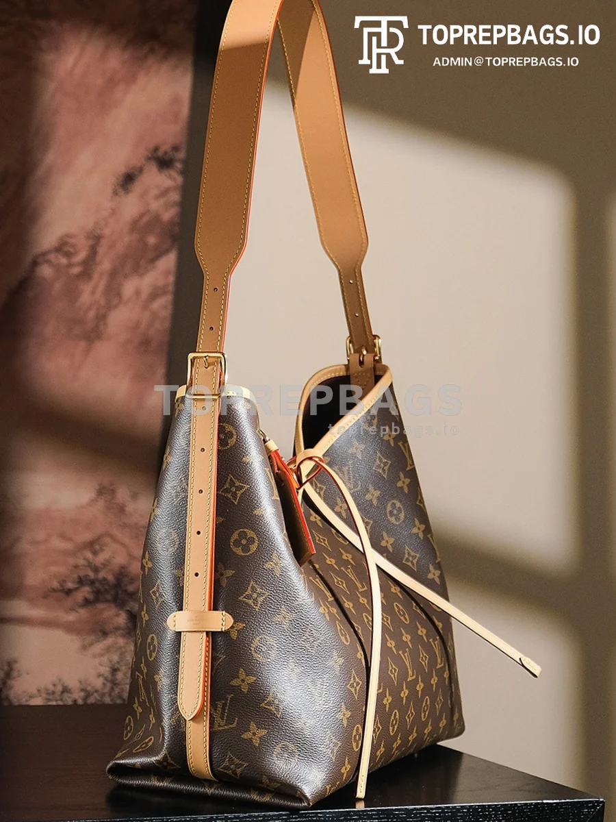 a1741599352866_3073 Louis Vuitton CarryAll in Brown