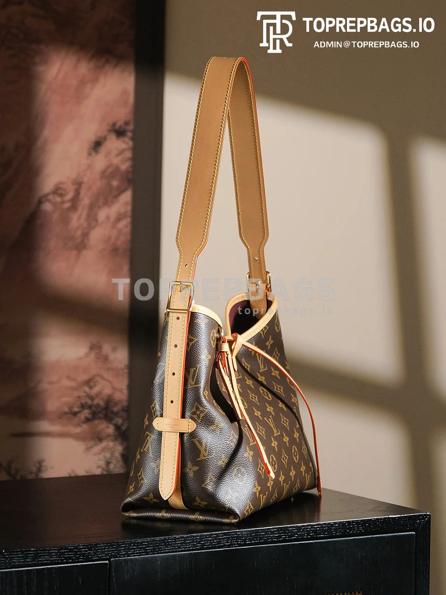 a1741604507716_7565 Louis Vuitton CarryAll in Brown