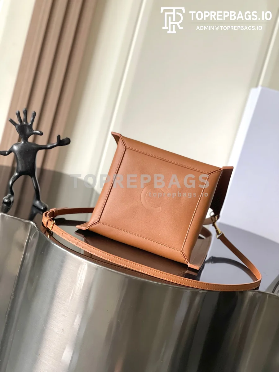a1778560678648_1848 Celine Cubo Small in Brown
