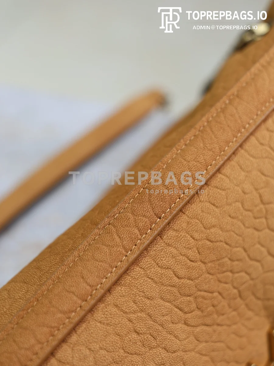 cmp_i1751094923917_1611_0_0 YSL Calypso in Brown