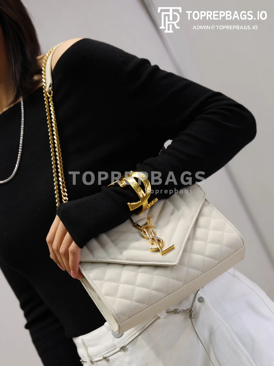 cmp_i1767779870729_6496_0_3 YSL Envelope Small in White