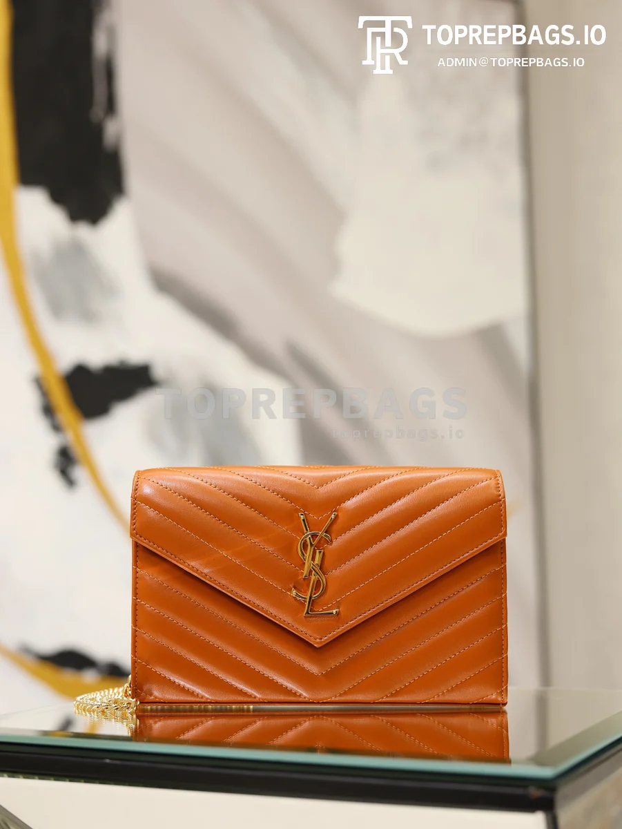 cmp_i1778831877283_2235_0_0 YSL Monogram Envelope in Orange