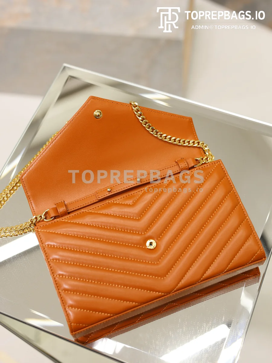 cmp_i1778831877283_2293_0_7 YSL Monogram Envelope in Orange