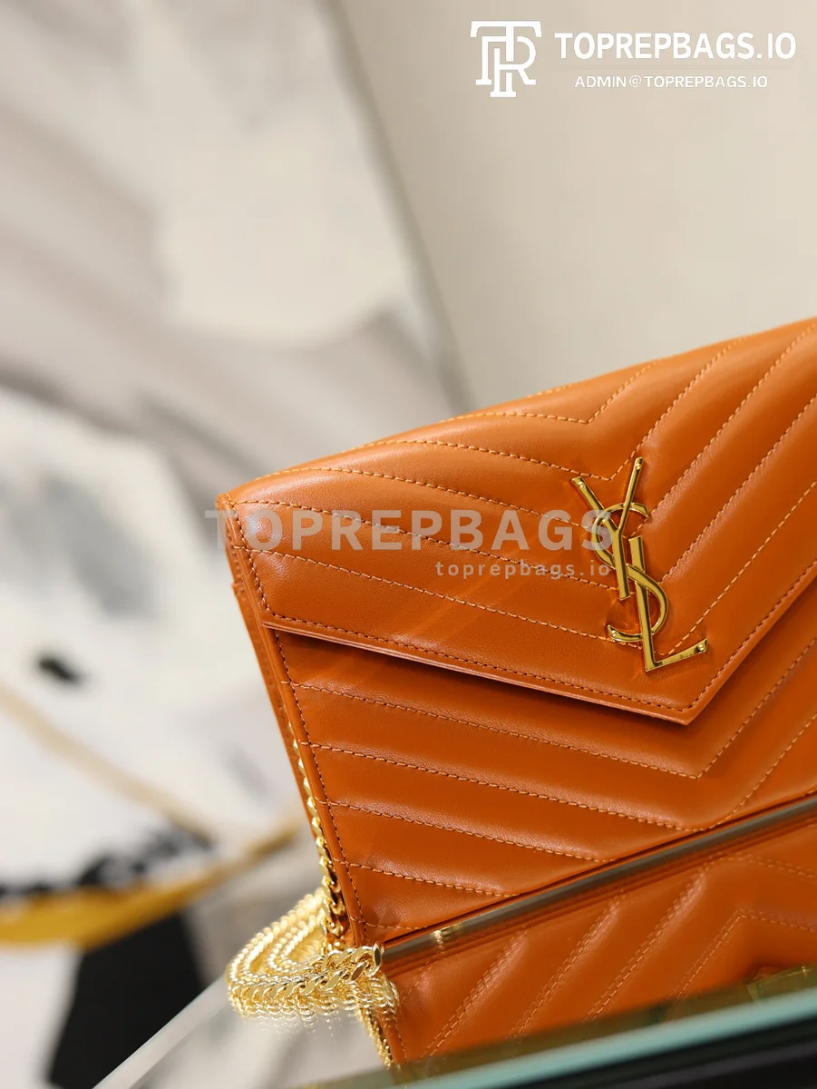 cmp_i1778831880756_1635_0_2 YSL Monogram Envelope in Orange