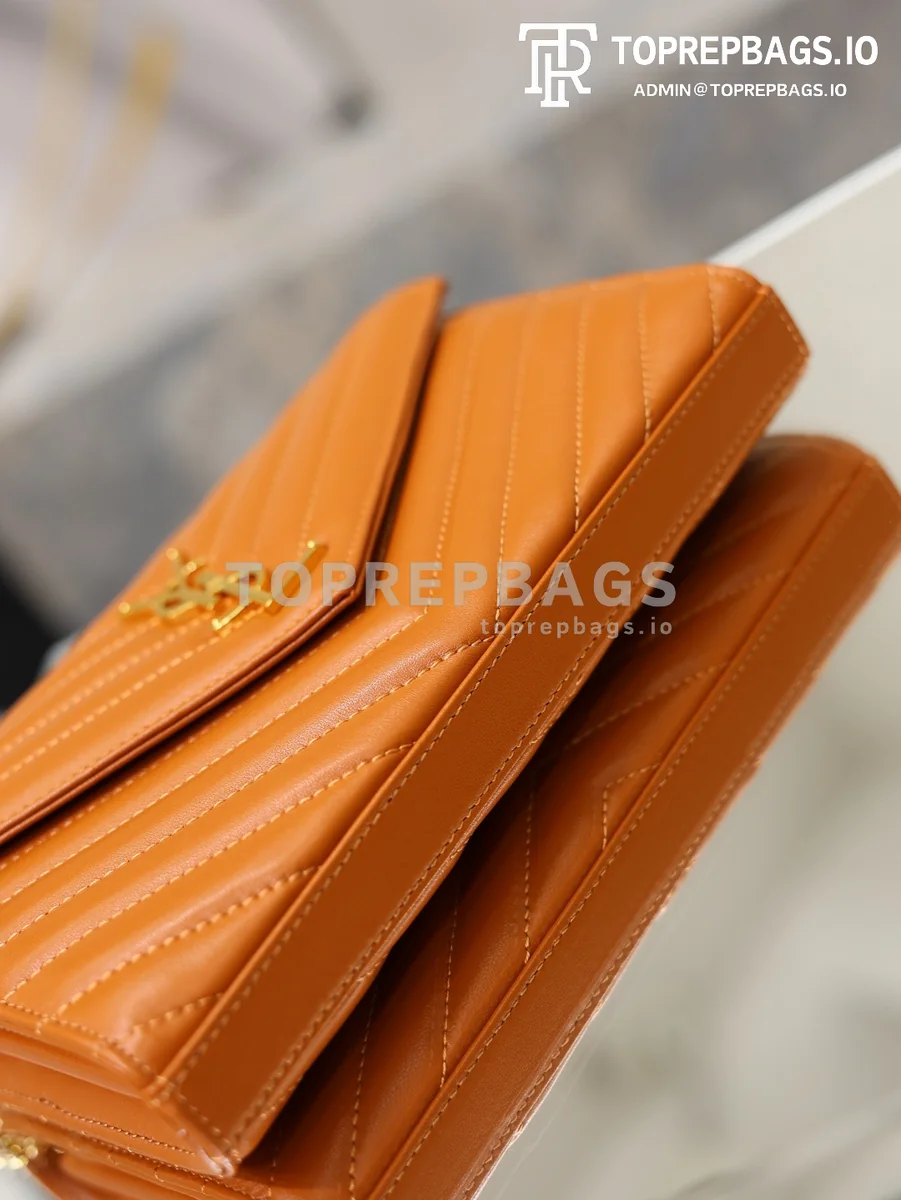 cmp_i1778831945553_2702_0_1 YSL Monogram Envelope in Orange