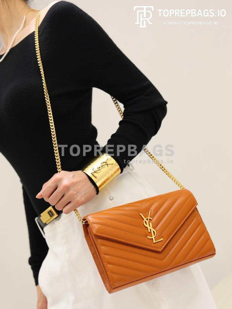 cmp_i1778831985234_5315_0_3 YSL Monogram Envelope in Orange