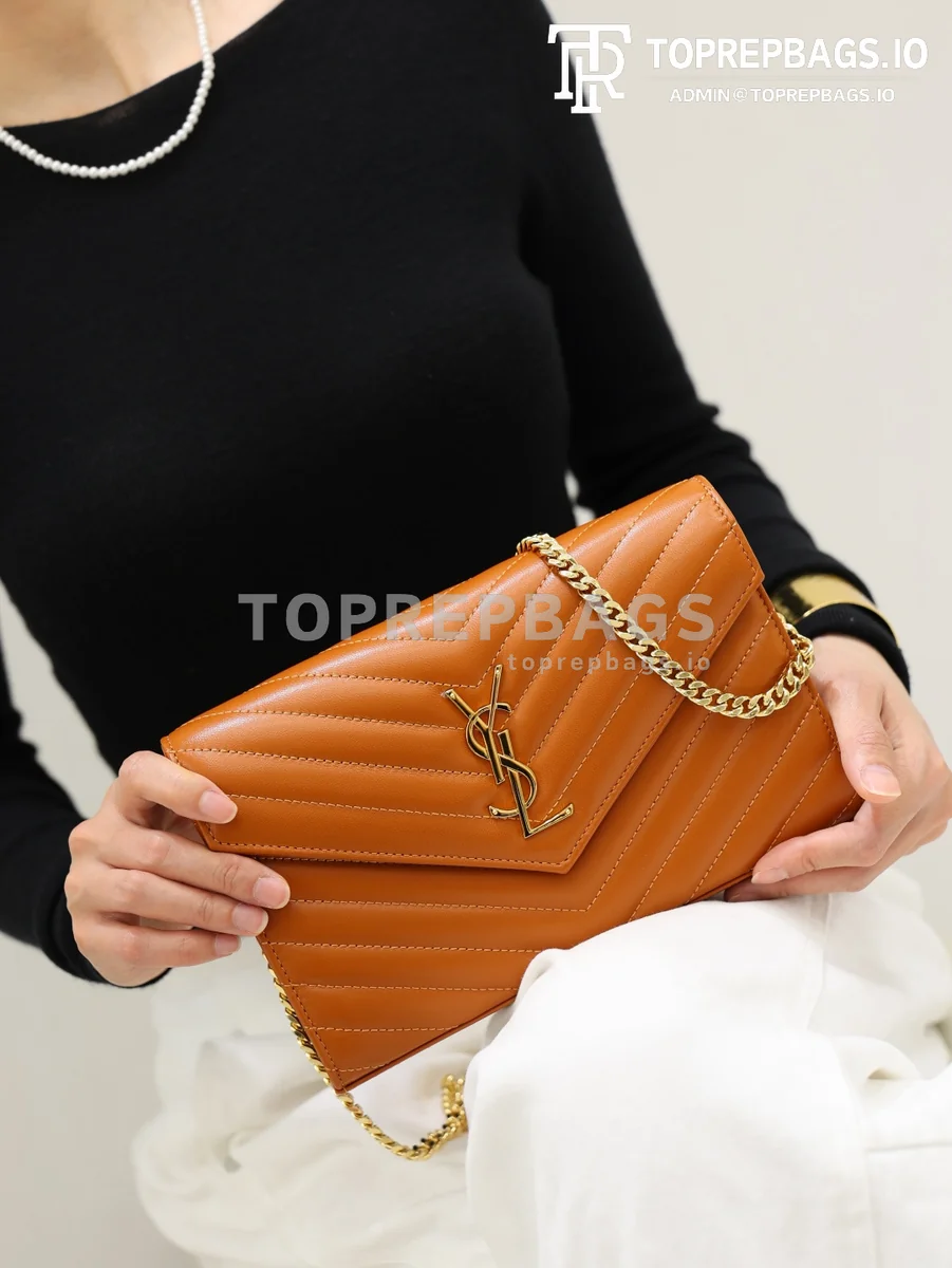 cmp_i1778831985329_5767_0_2 YSL Monogram Envelope in Orange