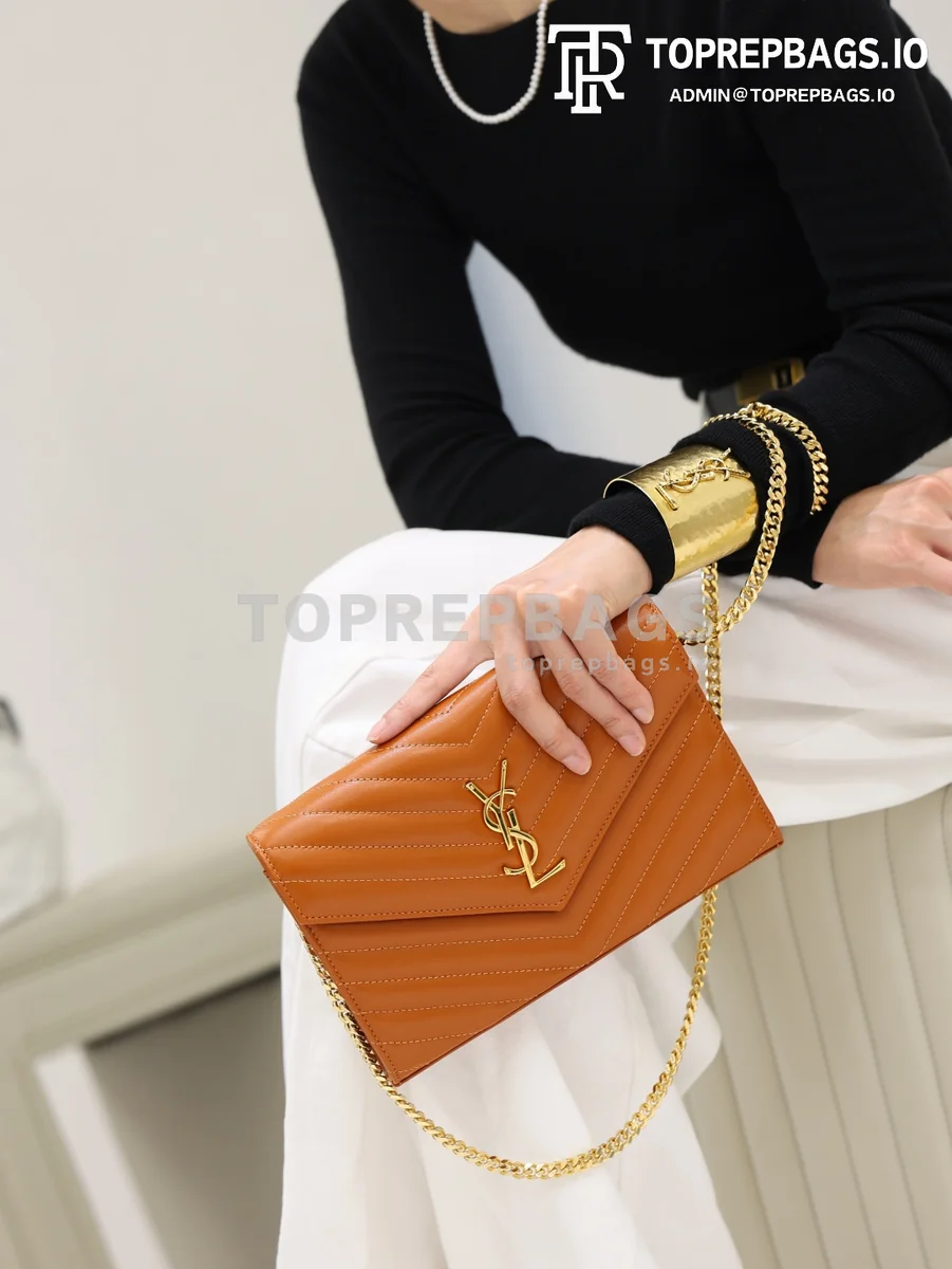 cmp_i1778831988227_6567_0_0 YSL Monogram Envelope in Orange