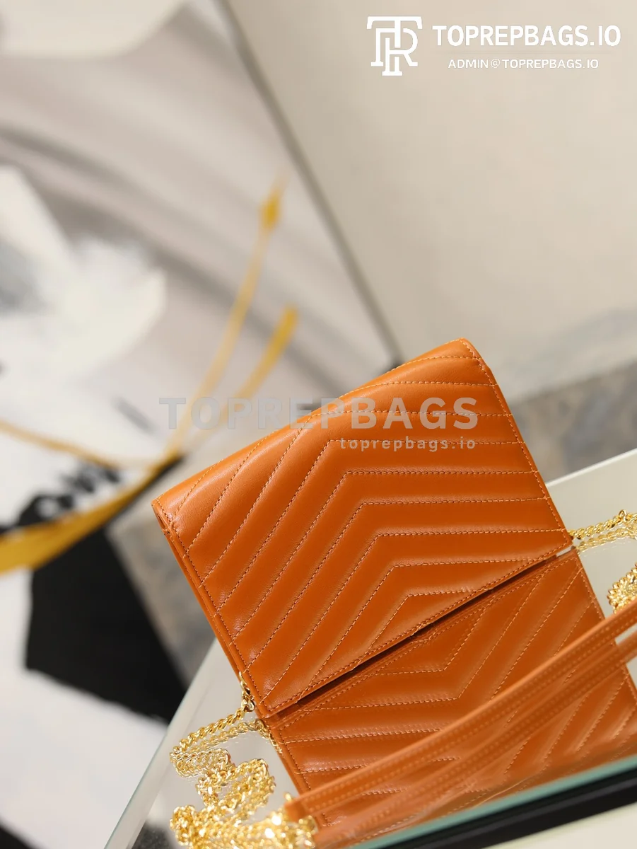 cmp_i1778832170996_5533_0_7 YSL Envelope WOC Small in Orange