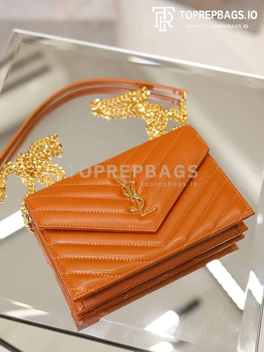 cmp_i1778832172777_4287_0_4 YSL Envelope WOC Small in Orange