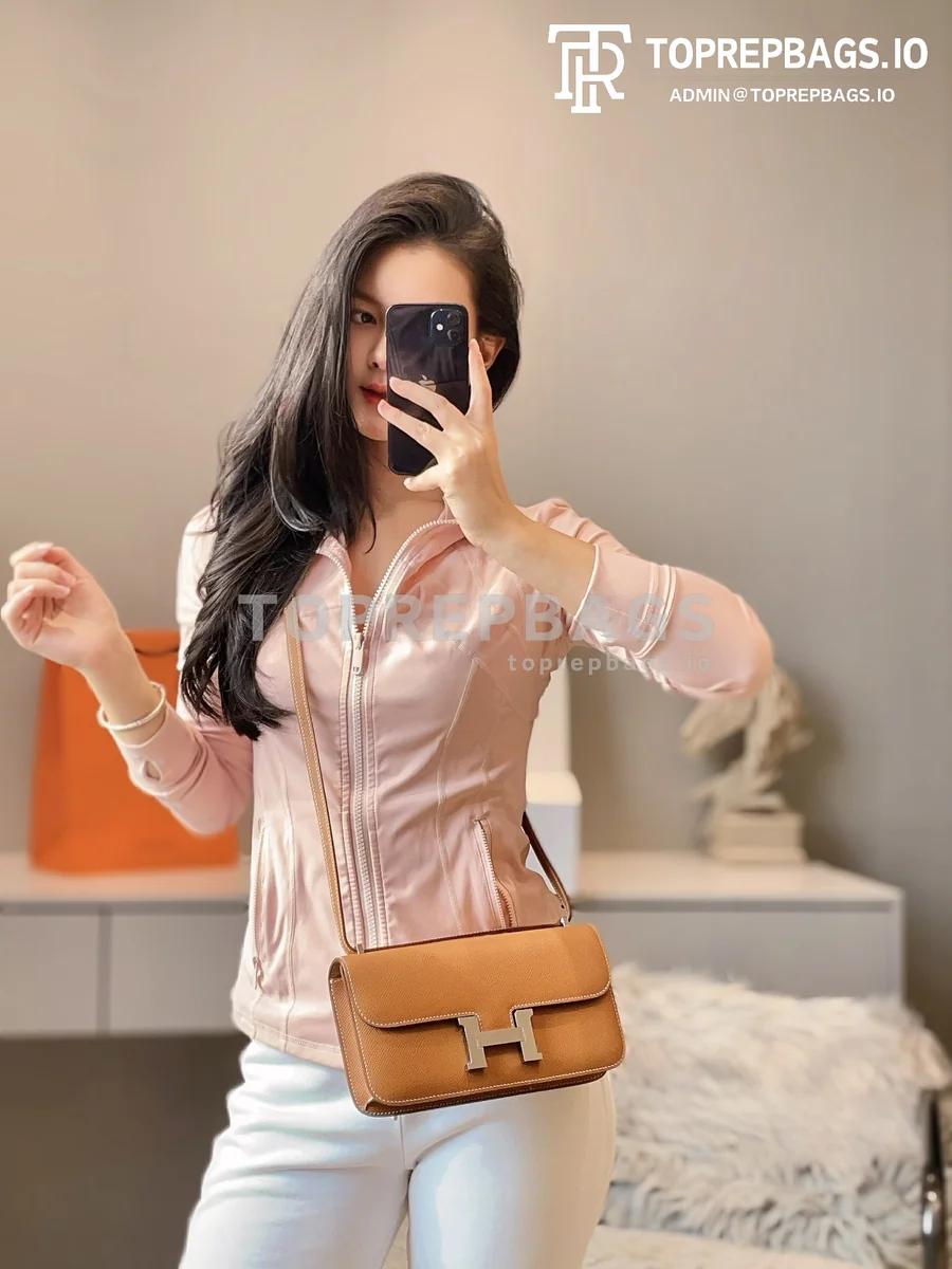 i1728470021_2882_0 Hermes Constance in Brown
