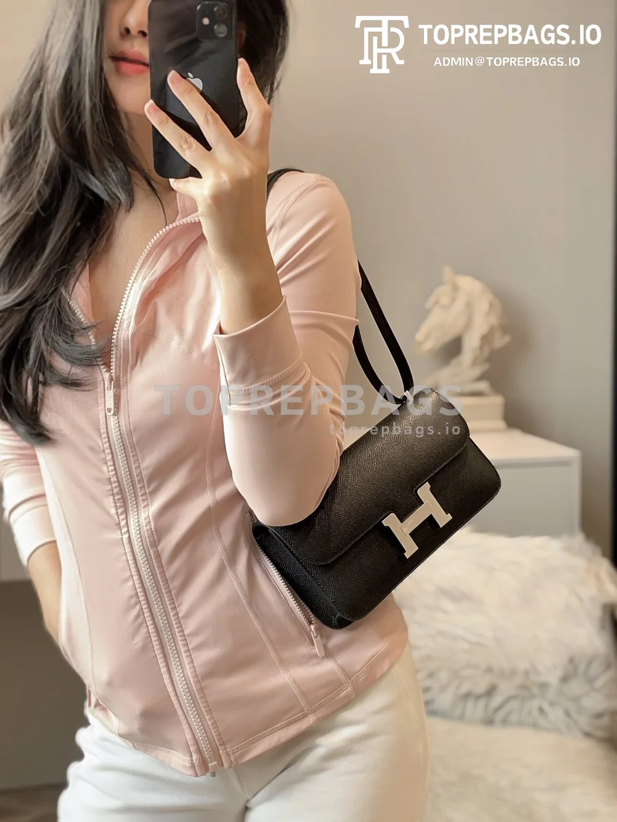 i1728470987_5739_0 Hermes Constance in Black