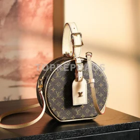 Louis Vuitton Petite Boite Chapeau in Brown