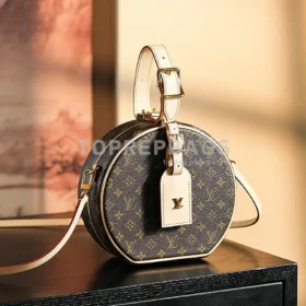 Louis Vuitton Petite Boite Chapeau in Brown