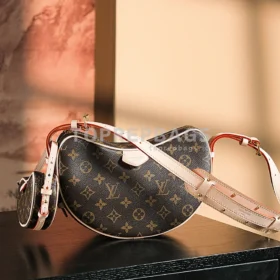 Louis Vuitton Croissant in Brown