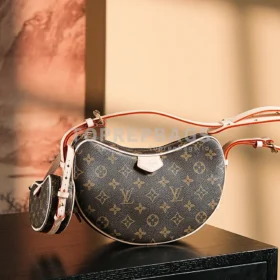 Louis Vuitton Croissant in Brown