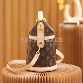 Louis Vuitton Duffle in Brown