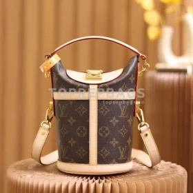 Louis Vuitton Duffle in Brown